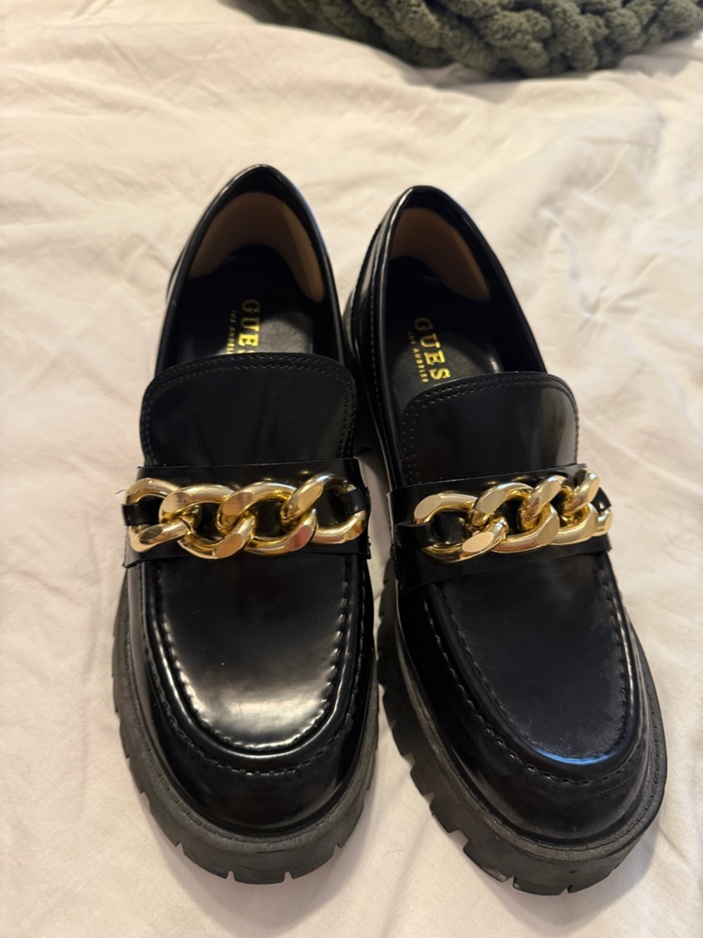 GUESS Black Leather Loafers with Gold Chain Accent